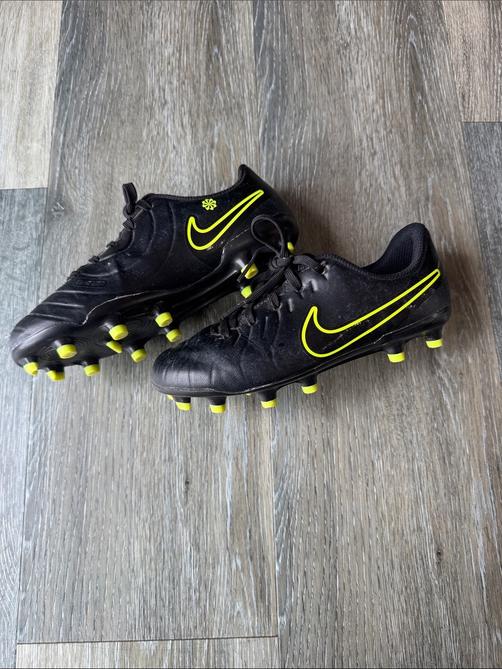 Nike Black Soccer Cleats with Neon Yellow Swoosh and Studs